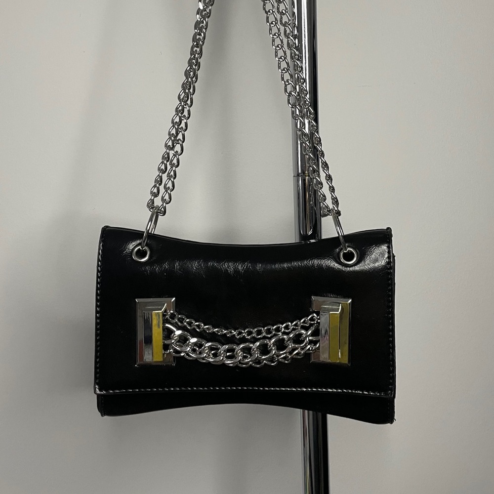 Black curved 90s bag with multi chain detail